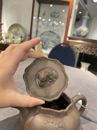 A Chinese Yixing stoneware teapot and cover, signed Li Yong 利永, Yixing seal mark, dated 1934