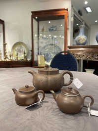 Two Chinese Yixing stoneware teapots and covers with brass mounts, one with Yigong 逸公 seal mark, 19/20th C.