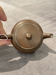 Two Chinese Yixing stoneware teapots and covers with brass mounts, one with Yigong 逸公 seal mark, 19/20th C.