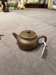 Two Chinese Yixing stoneware teapots and covers with brass mounts, one with Yigong 逸公 seal mark, 19/20th C.