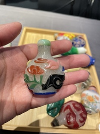 A varied collection of Chinese snuff bottles in glass, hardstone and jade, 19/20th C.