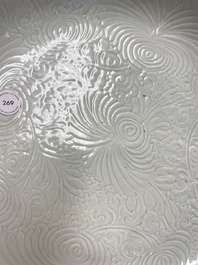 A Chinese floral anhua-decorated dish with blue and white rim, Yongzheng