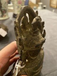 Een Chinese bronzen Boeddha en een perzikvormige wierookbrander, Ming en Qing