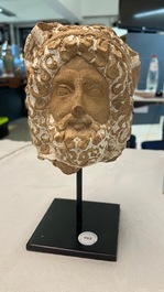 A Punic terracotta head of Serapis with traces of white engobe, Northern Africa, 2nd C. b.C.