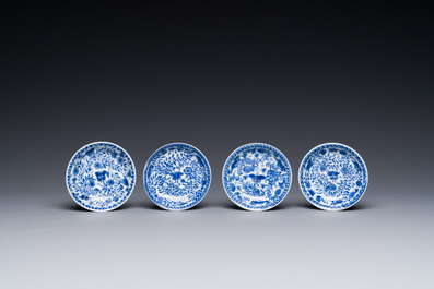 Four Chinese blue and white miniature cups and saucers, butterfly mark, Kangxi