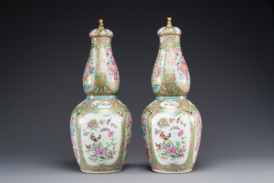 Paire de vases couverts de forme double gourde en porcelaine de Chine famille rose de Canton, 19&egrave;me