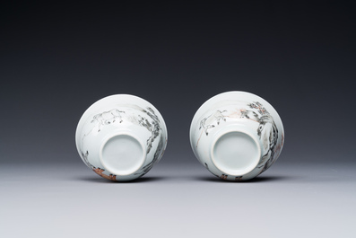 A pair of Chinese grisaille and iron-red 'buffalo' cups and saucers and a 'rooster' saucer, Yongzheng