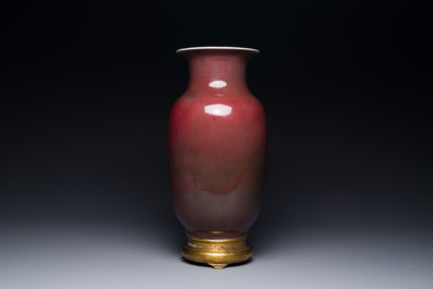 A Chinese monochrome copper-red-glazed vase with gilt bronze mount, 18/19th C