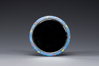 A Chinese Canton enamel circular hand mirror, early 19th C.