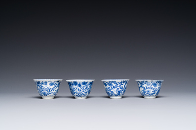 Four Chinese blue and white miniature cups and saucers, butterfly mark, Kangxi