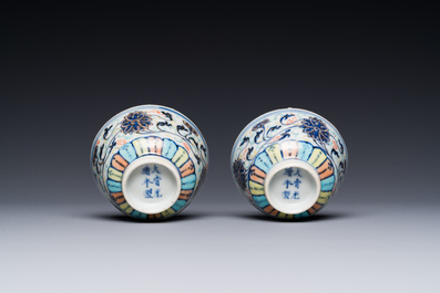 A pair of Chinese doucai 'lotus scroll' cups, Guangxu mark and of the period