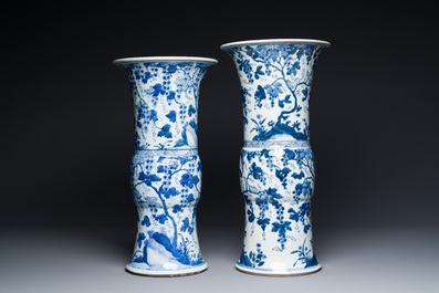 Two Chinese blue and white 'gu' vases with squirrels among grape vines, Kangxi