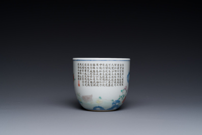 A Chinese famille rose cup with a boy and a rooster on wooden base, Qianlong mark, 20th C.