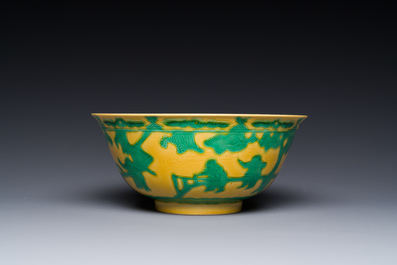 A Chinese yellow-ground 'playing boys' bowl, Yongzheng mark and prossibly of the period