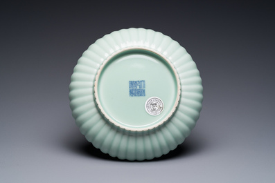 A Chinese celadon-glazed chrysanthemum-shaped plate, Qianlong mark, 20th C.