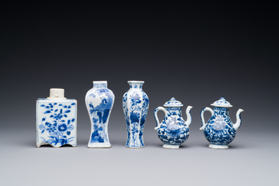 Two Chinese blue and white vases, two miniature jugs and a tea caddy, Kangxi