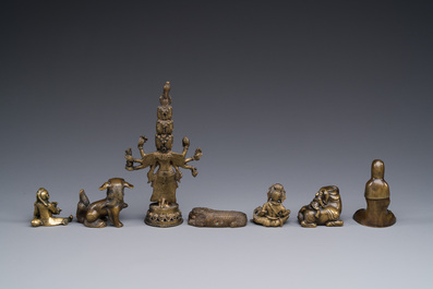 A collection of Chinese and Sino-tibetan bronze sculptures and paper weights, Qing