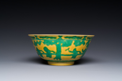 A Chinese yellow-ground 'playing boys' bowl, Yongzheng mark and prossibly of the period