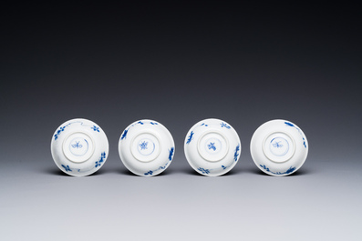 Four Chinese blue and white miniature cups and saucers, butterfly mark, Kangxi