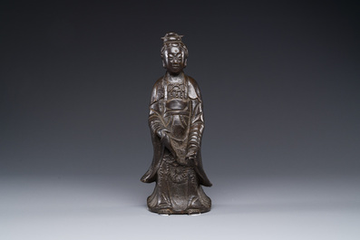 A Chinese bronze figure of a standing Guanyin, Ming