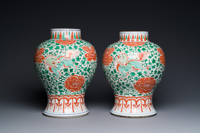 A pair of Chinese famille verte 'Buddhist lion' vases with gilt bronze mounts, Kangxi