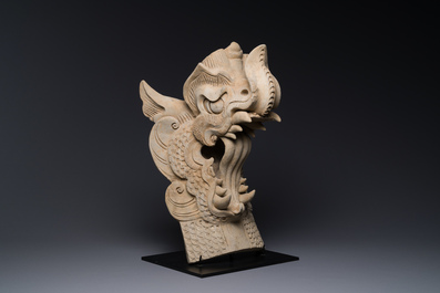 A Chinese pottery dragon head architectural tile, Song/Jin