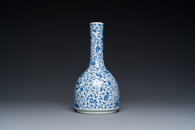 A Chinese blue and white 'lotus scroll' bottle vase, Yongzheng mark and possibly of the period