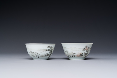 A pair of Chinese grisaille and iron-red 'buffalo' cups and saucers and a 'rooster' saucer, Yongzheng