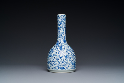 A Chinese blue and white 'lotus scroll' bottle vase, Yongzheng mark and possibly of the period