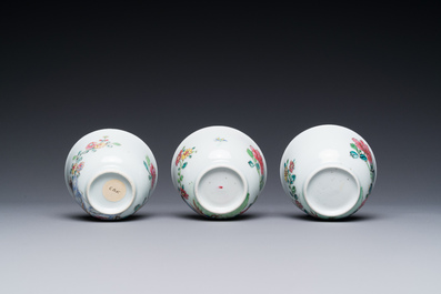 Three Chinese famille rose 'pheasant' cups and saucers, Yongzheng