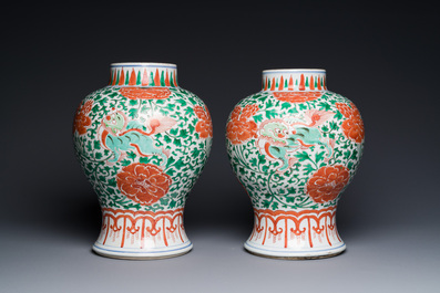 A pair of Chinese famille verte 'Buddhist lion' vases with gilt bronze mounts, Kangxi