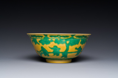 A Chinese yellow-ground 'playing boys' bowl, Yongzheng mark and prossibly of the period