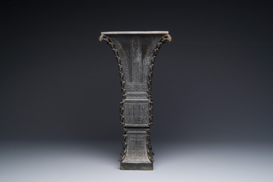 A Chinese bronze 'zun' vase with taotie design, Ming