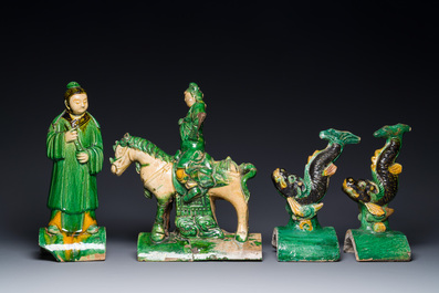 A pair of Chinese sancai roof tiles in the shape of a fish, a warrior on horseback and a sage, Ming
