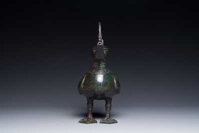 A Chinese archaistic bronze wine vessel in the shape of a goose, Song