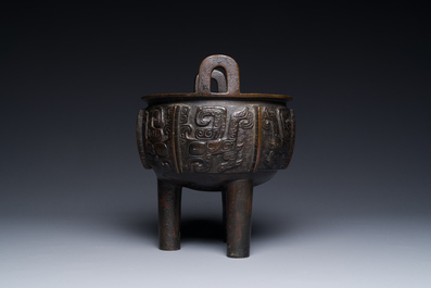 A Chinese archaistic bronze tripod censer on wooden stand, 'ding', Song/Ming