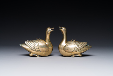 A pair of Chinese silver-inlaid bronze duck-shaped water droppers, Qing