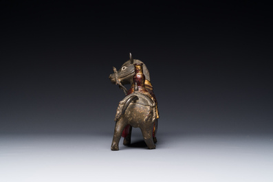 A rare Chinese partly lacquered and gilt bronze incense holder in the shape of a horse, Yuan/early Ming