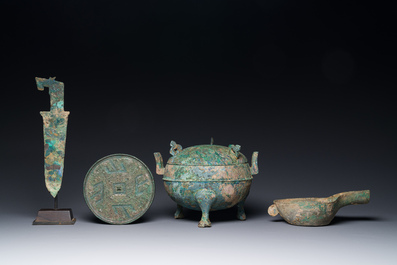 A group of four Chinese archaic bronze wares, late Shang, Warring States and Han