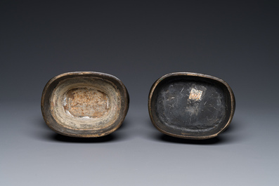 A pair of Chinese bronze 'hu' vases with Taotie design, Song/Yuan