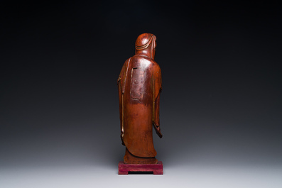 A Chinese partly gilt and lacquered wooden sculpture of Guanyin, Ming