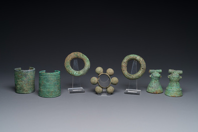 A collection of bronze bracelets and animal bells, Vietnam and Cambodia, 4th/1st C. B.C