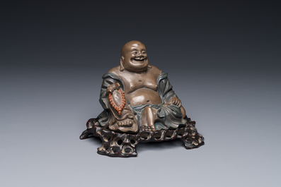 A Chinese Foochow or Fuzhou lacquer Buddha on stand, ca. 1900