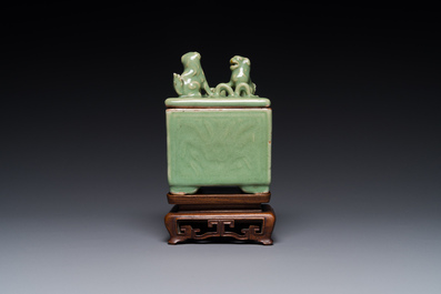 A Chinese Longquan celadon rectangular censer and cover on wooden stand, Ming