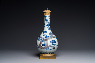 A Chinese blue, white and copper-red 'dragon' vase with gilt bronze mounts, 18th C.