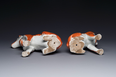 A pair of Chinese polychrome export porcelain models of dogs, Qianlong