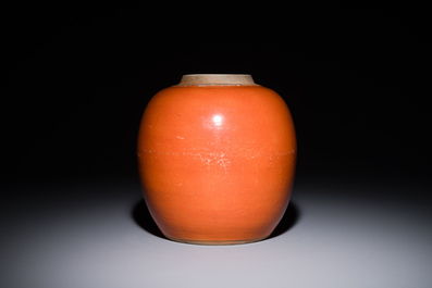 A Chinese monochrome coral-red-glazed ginger jar with wooden cover, 18th C.