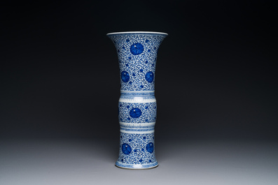 A Chinese blue and white 'chrysanthemum scroll' 'gu' vase, Kangxi