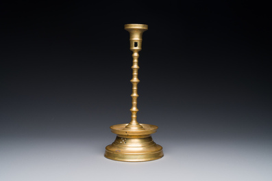 A knotted bronze candlestick, Southern Netherlands, probably 16th C.