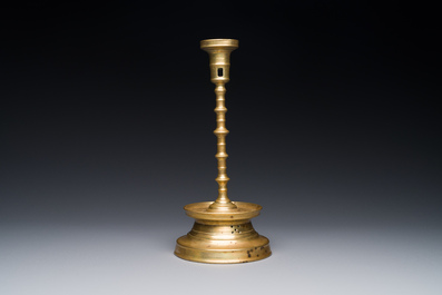 A knotted bronze candlestick, Southern Netherlands, probably 16th C.